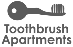 Toothbrush Apartments Logo